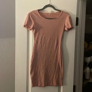 Ribbed bodycon dress/ mauve/ mid-thigh length.